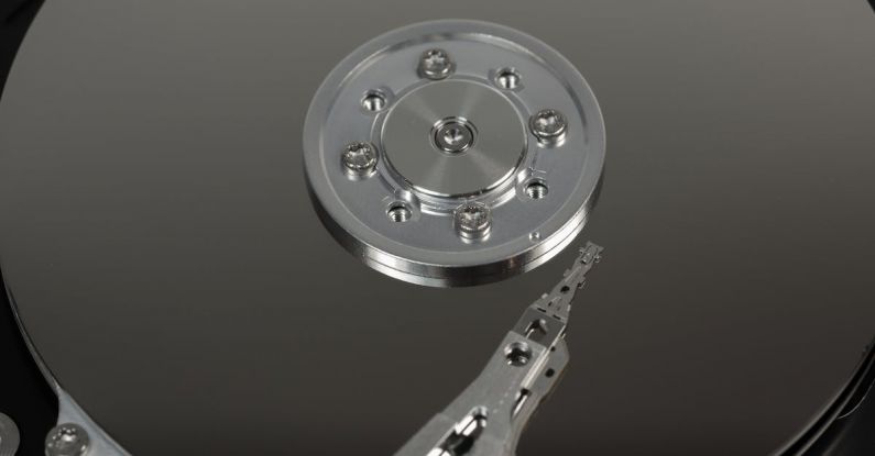 Hard Drives - Grey Metal Plier on Round Disc