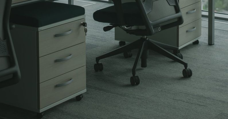 Ergonomic Chairs - Black Rolling Chair Inside the Office