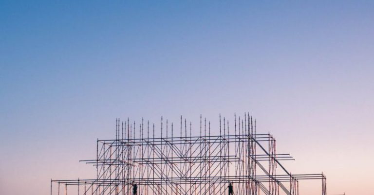 Build - Photo of People on Building Under Construction