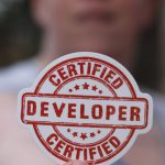 Certified - Finger Holding Badge