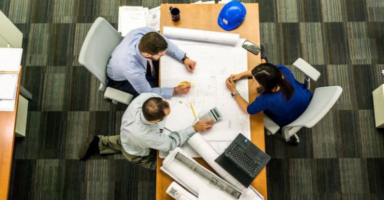 Organization - Three People Sitting Beside Table