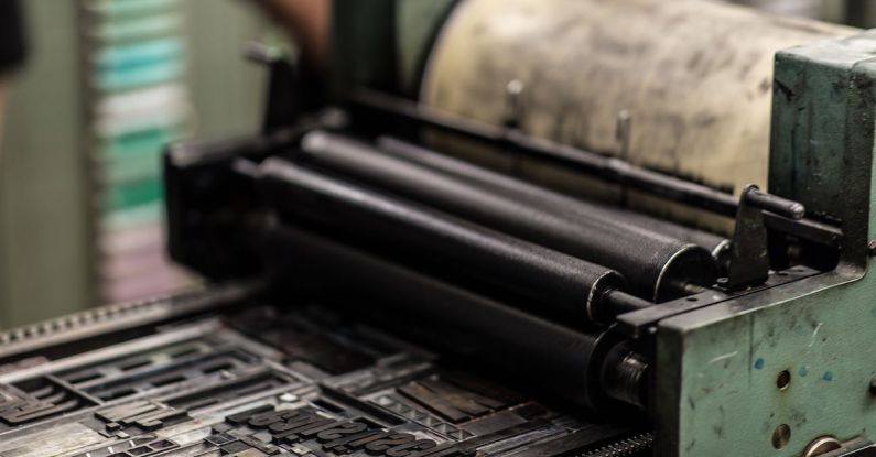 Printers - Green and Black Industrial Machine