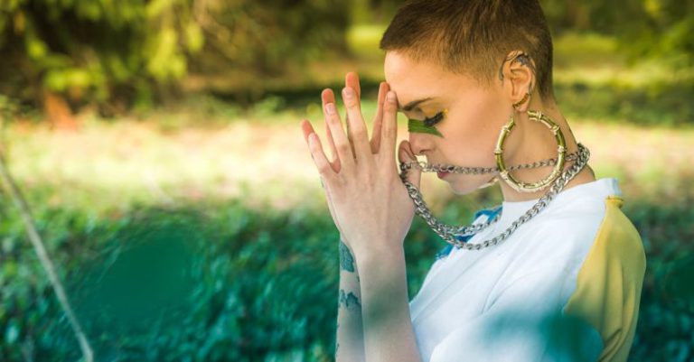 Source - Photo Of Woman Wearing White Shirt