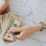 Accounting - Person Holding US Dollar Bills