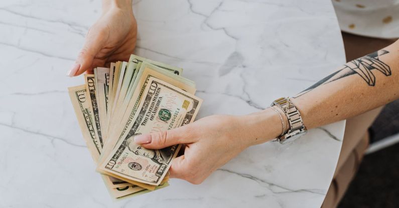 Accounting - Person Holding US Dollar Bills