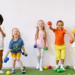 Latest Games - Little Girls and Boys Having Fun Playing With Colorful Balls